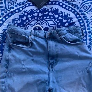 Forever 21 light blue ripped jeans.